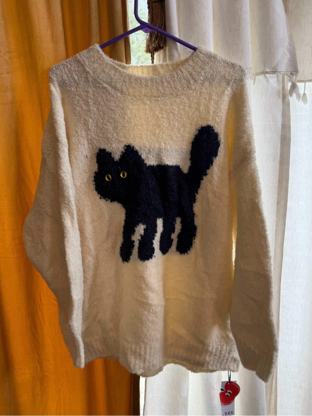 Cider Cream Sweater with Black Cat and Yellow Eyes
